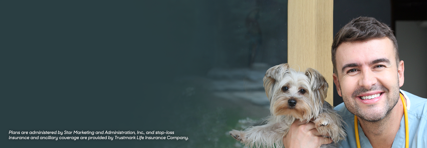 Employer smiling with small dog. Small Business Benefits for employers log in